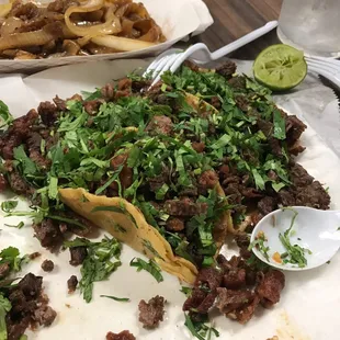 &quot;Mixta&quot; tacos are delicious!  Two tacos down...having a break before I take down the other three.