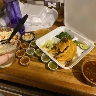 a person holding a knife over a plate of food