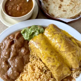 #11 Tejas Plate. Substituted cheese enchiladas for chicken enchiladas and refried beans for charro beans.