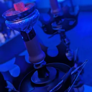 a row of wine glasses on a table