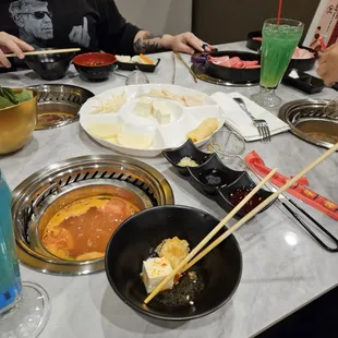 The tomato broth was so good I forgot to take a picture before eating everything. The beanbcurd rolls were incredible we orded them like 3x