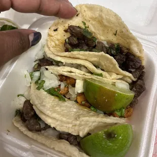 Carne asada tacos and Al pastor tacos