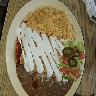 Veggie enchiladas and veggie super wet burrito.