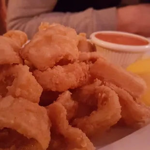 -The Calamari -Crunchy, seasoned properly, not overly salty. -The roasted pepper sauce is not spicy, and is out of this world.