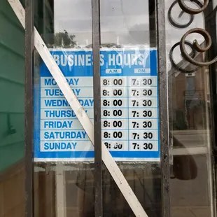 a business hours sign
