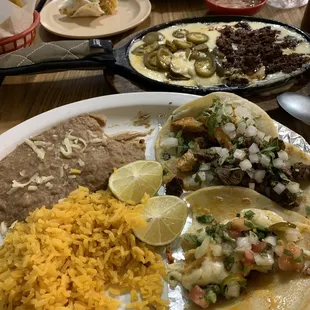 a table full of mexican food