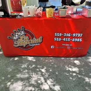 a table with a red table cloth