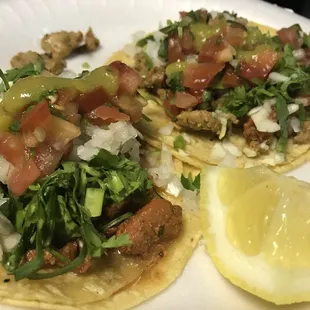 One taco alpastor and one of chicken