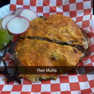 a fried muffin in a basket