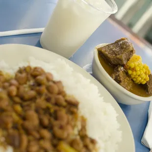 Beef Stew. White rice and beans. Coconut Juice.