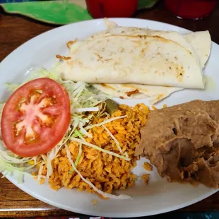 Cheese tostadas with beans and rice