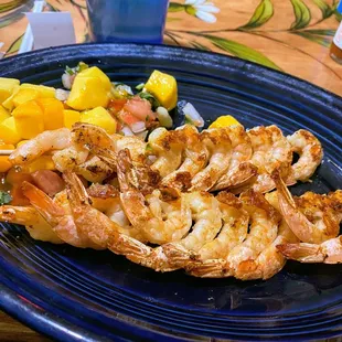 Shrimp skewers with mango salsa app