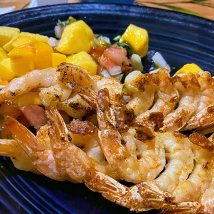 Shrimp skewers with mango salsa app