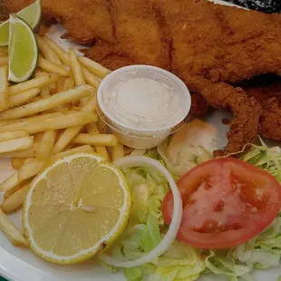Whole Catfish, served with fries and salad