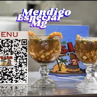 a menu and two glasses of drink