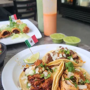 a plate of chicken tacos