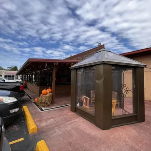 a glass case in a parking lot