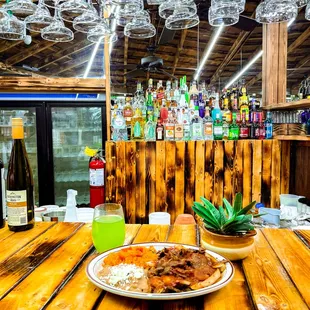 a plate of food on a wooden table