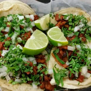 Tacos al pastor- they&apos;re very tasty.  They&apos;re the two bite tacos.