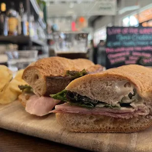 a sandwich on a cutting board