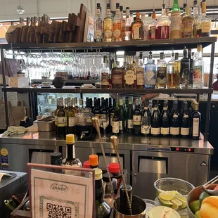 a bar with a lot of bottles of liquor