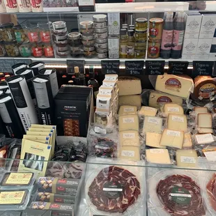 a variety of cheeses and meats