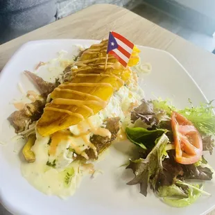 El Tostone Jibarito sándwich- amazing and stuffed with pernil and pastrami and queso frito! Delicious-it was huge!