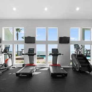 Gym overlooking pool and bay
