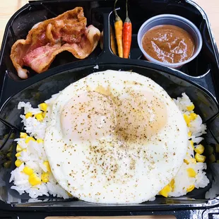 &quot;It&apos;s an Asian Thing&quot; Plate
(Eggs over white rice w/corn, bacon, Thai chili&apos;s, &amp; Asian salsa)