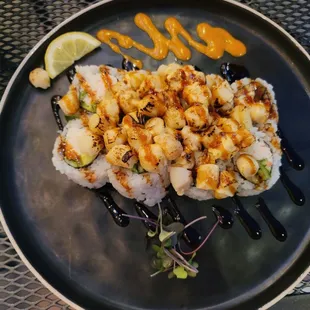 a plate of sushi on a table