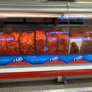Marinated meat section, chicken and meats etc