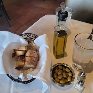 complimentary bread, olive oil, olives, water