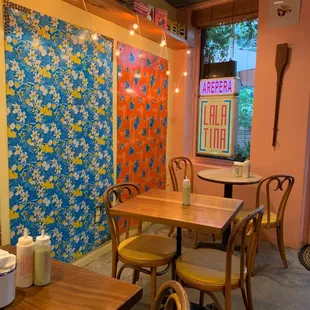 a table and chairs in a restaurant