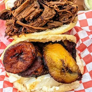 Cheese &amp; Sweet Plantains Arepa with Guayanés and Asado Negro &amp; Cheese Arepa with Queso De Mano