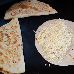a tortilla with cheese on it