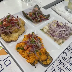 four plates of food on a table