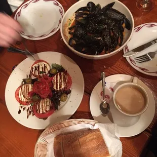 Caprese, mussels, and bread.