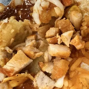 The enchiladas come with tiny cubes of chicken.  Mine were dry