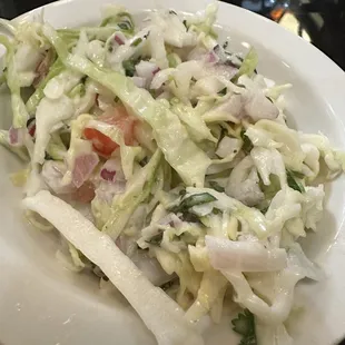 Complementary coleslaw.  Its pretty good!