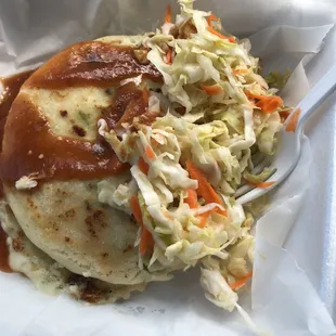 a sandwich with coleslaw