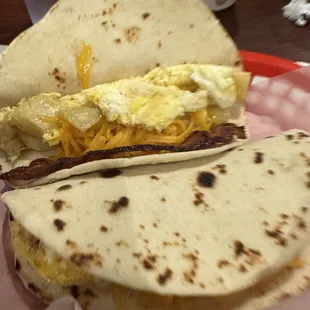a breakfast sandwich on a tortilla