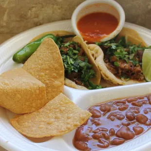 Tacos with a lot of cilantro and lime. So beautiful.