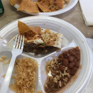 Asada pupusa, beans and rice and a steak quesadilla. DELICIOUS!!!