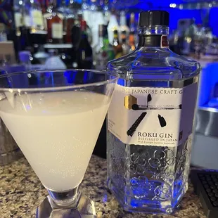 a martini and a bottle of rum