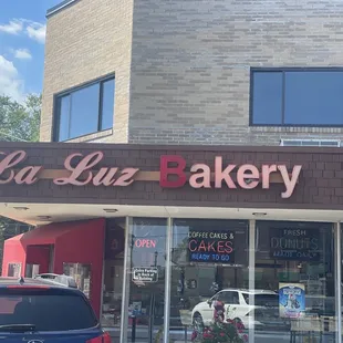 a car parked in front of the store