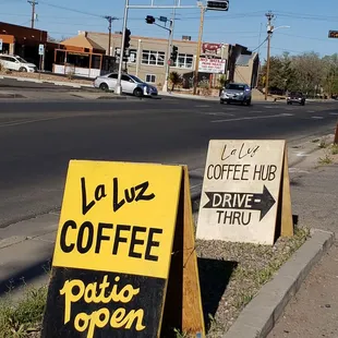 Signs by the sidewalk