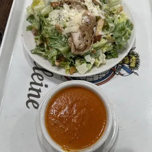 Caesar with chicken and a tomato soup