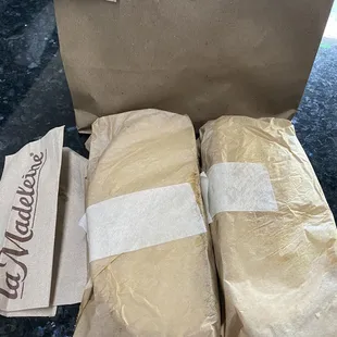 Normally sandwiches are wrapped in foil and boxed so it stays warm
