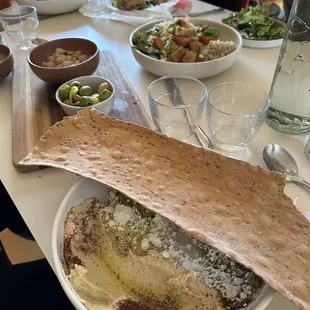 House made hummus and baked cracker with olive tapenade