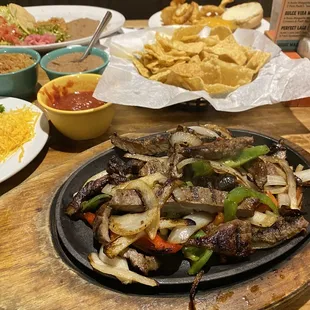 a variety of mexican food on a table